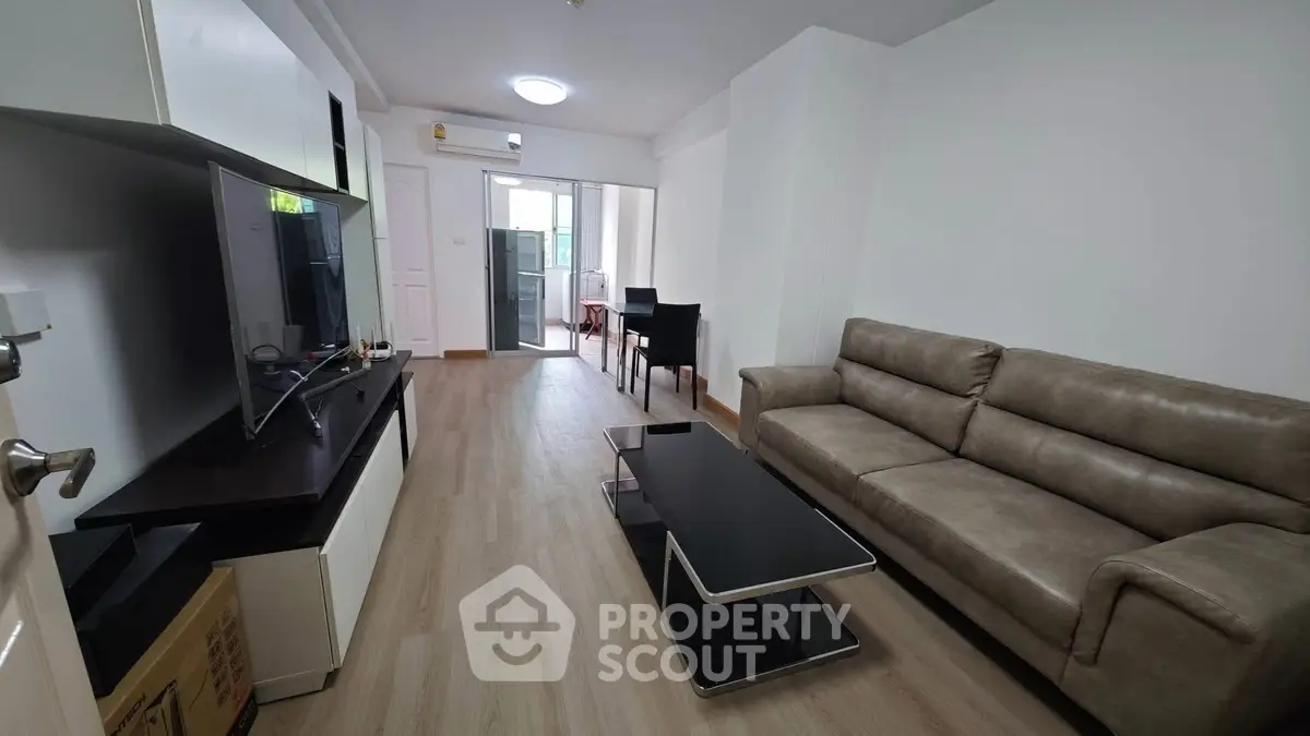 Modern living room with sleek furniture and open layout, perfect for contemporary living.