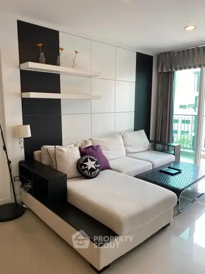 Modern living room with stylish sectional sofa and sleek decor