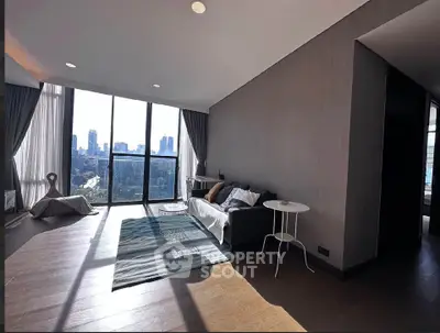 Spacious modern living room with panoramic city view and elegant decor