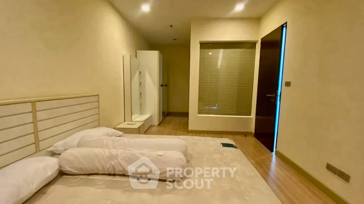 Spacious bedroom with modern design and cozy ambiance