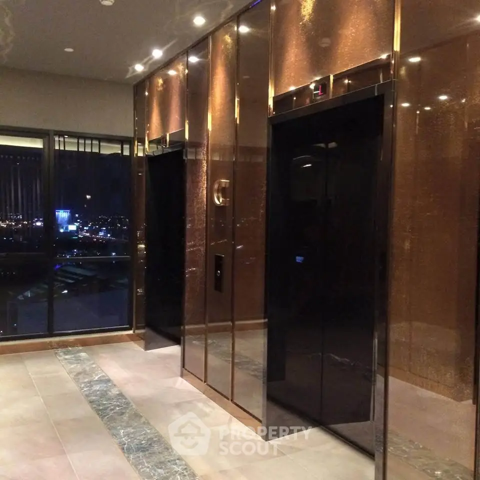 Luxurious modern elevator lobby with city view in upscale building