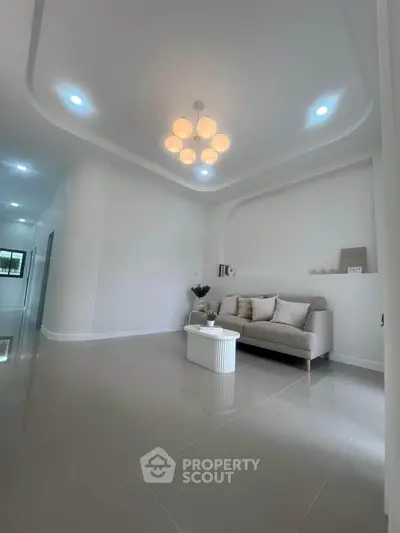 Modern living room with elegant lighting and minimalist decor