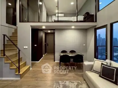 Modern loft apartment with mezzanine bedroom and city view
