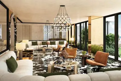 Luxurious modern living room with elegant decor and large windows offering stunning views.