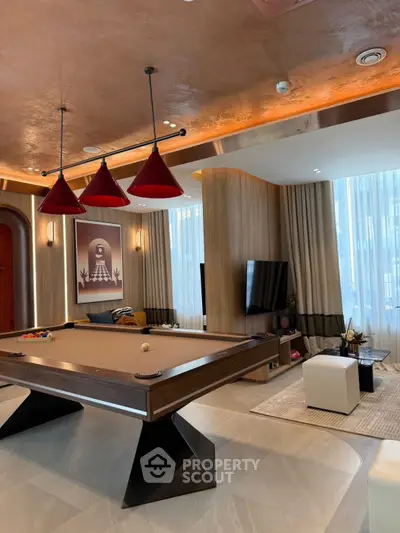 Luxurious modern living room with pool table and stylish decor