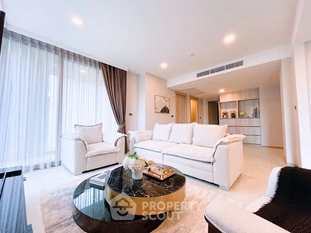 Spacious modern living room with elegant decor and natural light