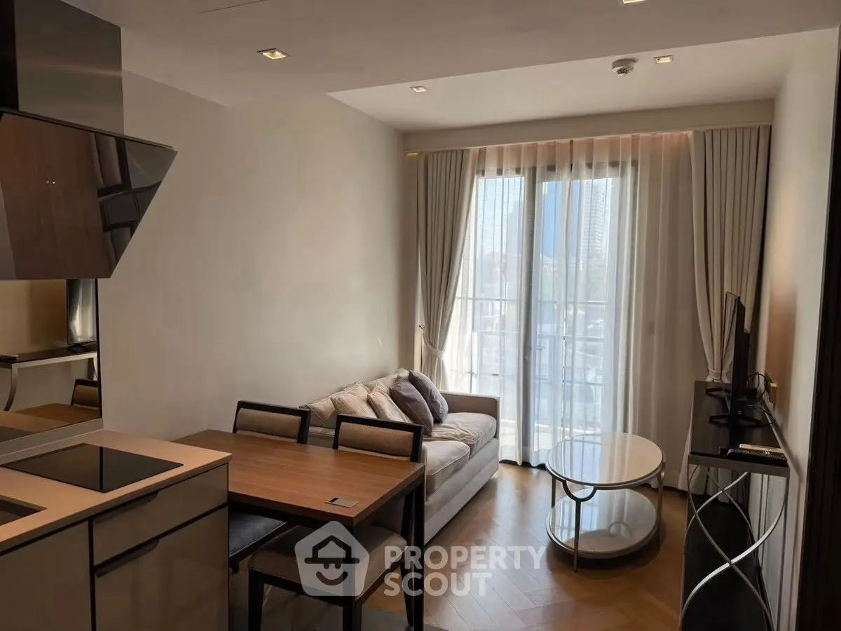 Modern living room with open kitchen and elegant decor