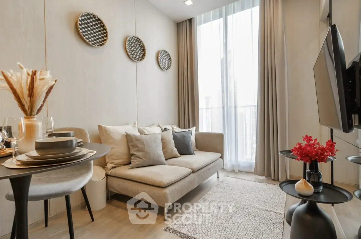 Chic modern living room with cozy sofa and stylish decor, perfect for urban living.