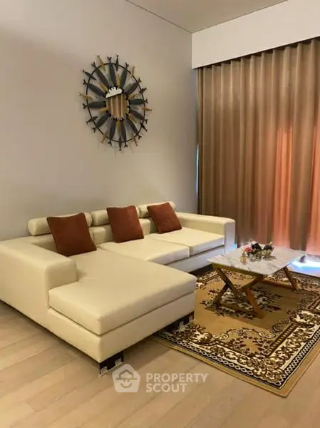 Stylish living room with modern white sectional sofa and elegant decor