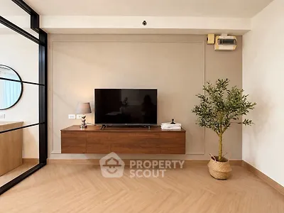 Modern living room with sleek TV unit and stylish decor