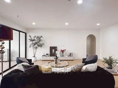 Spacious modern living room with elegant decor and natural light