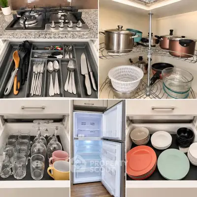 Modern kitchen with gas stove, organized drawers, and spacious fridge in a stylish apartment.