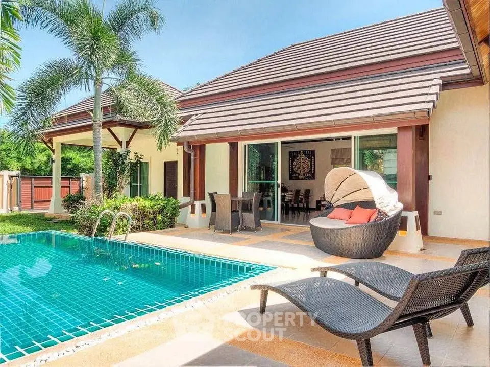 Luxurious villa with private pool and lush garden, perfect for relaxation and entertaining.