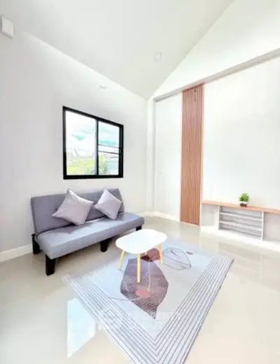 Modern minimalist living room with high ceiling and stylish decor