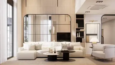 Luxurious modern living room with elegant furniture and large windows