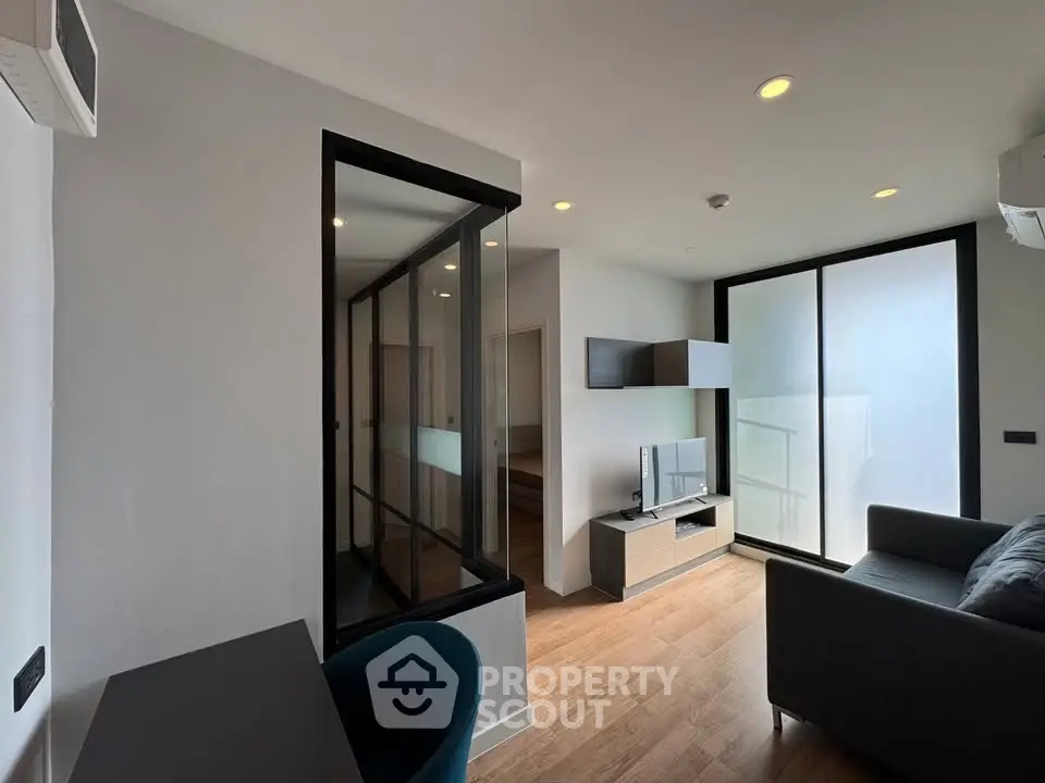 Modern living room with sleek design and natural light