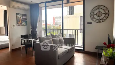 Modern living room with balcony view and stylish decor