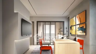 Modern living room with vibrant red chairs and abstract art