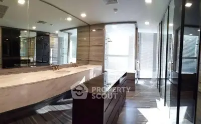 Luxurious modern bathroom with sleek design and ample natural light