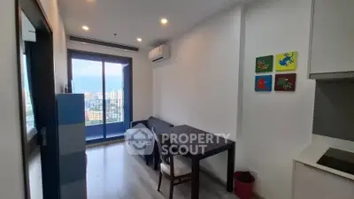 Modern living room with city view and balcony access