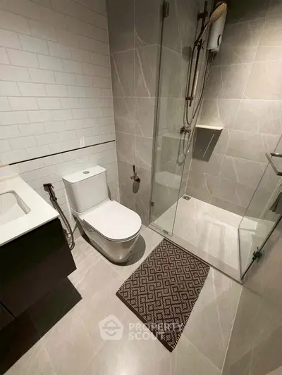 Modern bathroom with sleek design and glass shower enclosure