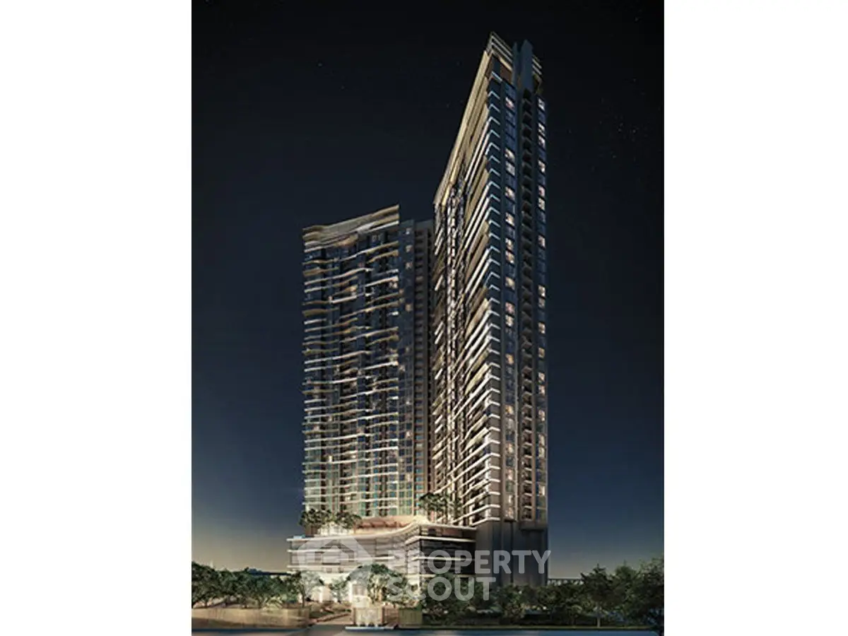 Stunning night view of modern high-rise residential building with illuminated facade.