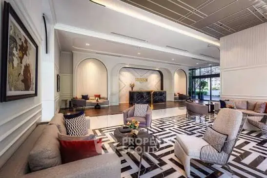 Luxurious modern living room with elegant decor and stylish furniture in a high-end property.