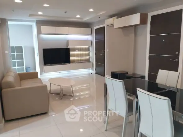 Modern living room with sleek furniture and open layout design.