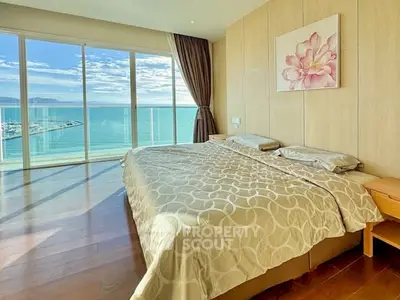 Luxurious bedroom with stunning ocean view and elegant decor