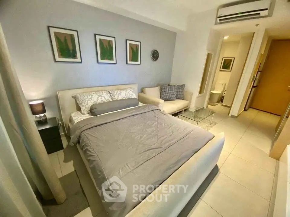 Cozy modern bedroom with elegant decor and ensuite bathroom