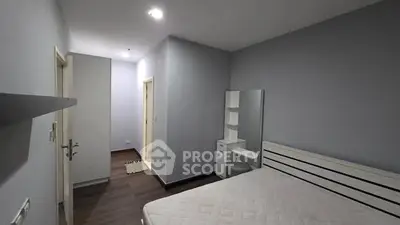 Modern minimalist bedroom with sleek design and neutral tones