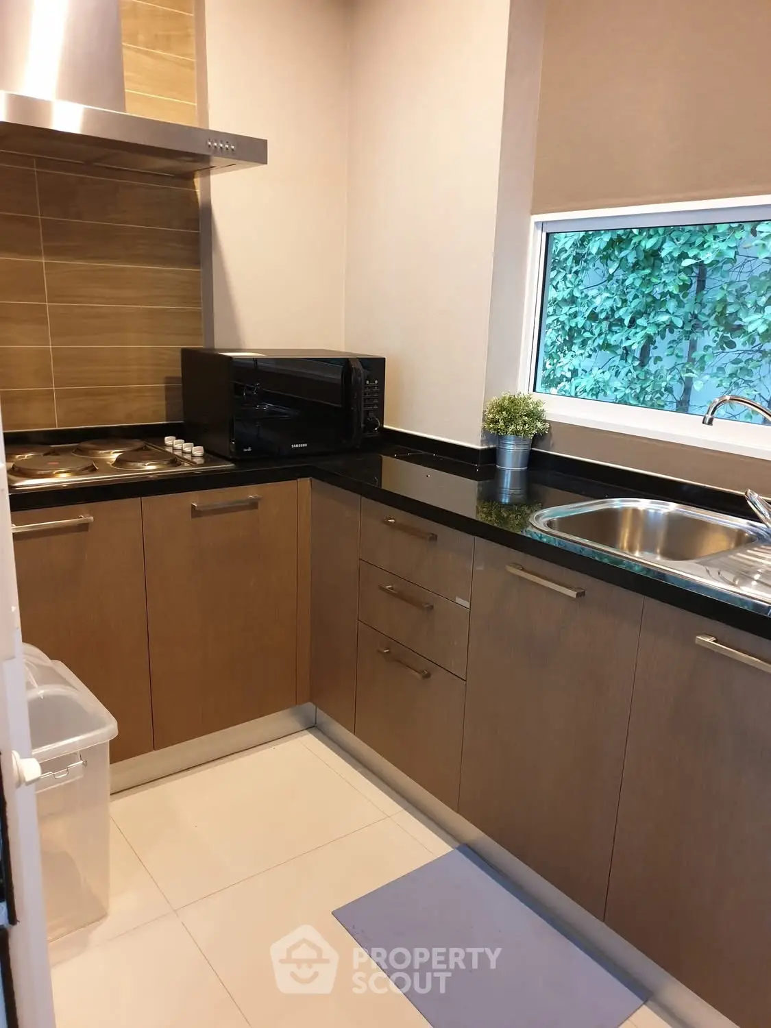 Modern kitchen with sleek cabinetry and stainless steel appliances