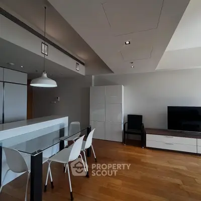 Modern living room with sleek dining area and contemporary furniture