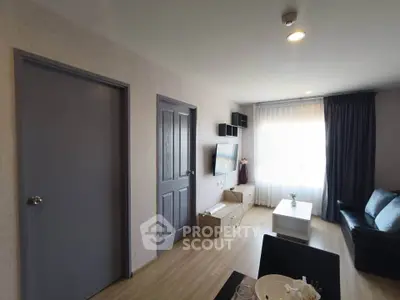 Modern living room with sleek design and natural light