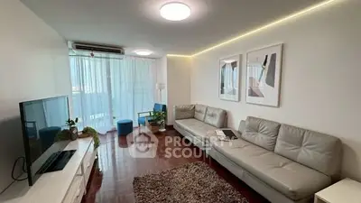 Spacious modern living room with stylish decor and natural light