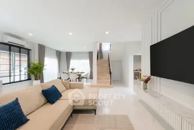 Spacious modern living room with elegant decor and open layout