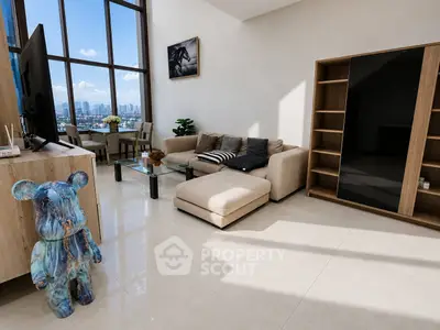 Luxurious living room with panoramic city view, modern furniture, and elegant decor in high-rise apartment.