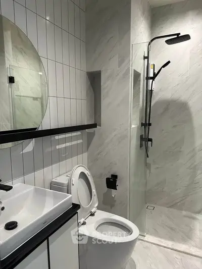 Modern bathroom with sleek shower and stylish fixtures