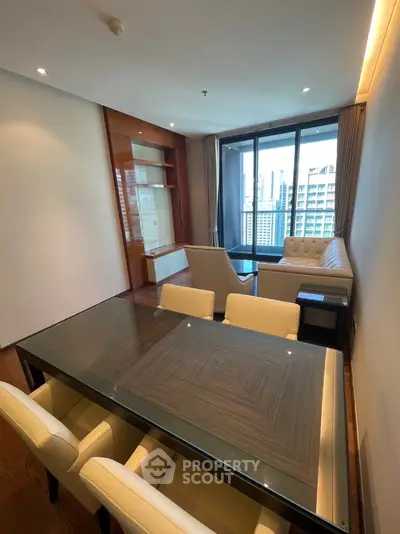 Modern living room with elegant dining area and city view