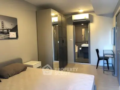 Modern bedroom with ensuite bathroom and sleek decor