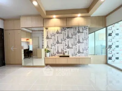 Spacious modern living room with elegant decor and ample natural light