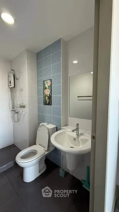 Modern bathroom with sleek fixtures and stylish tile accents