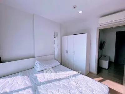 Bright and cozy bedroom with modern furnishings and ample natural light