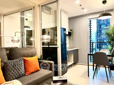 Modern open-layout living room with stylish decor and balcony view