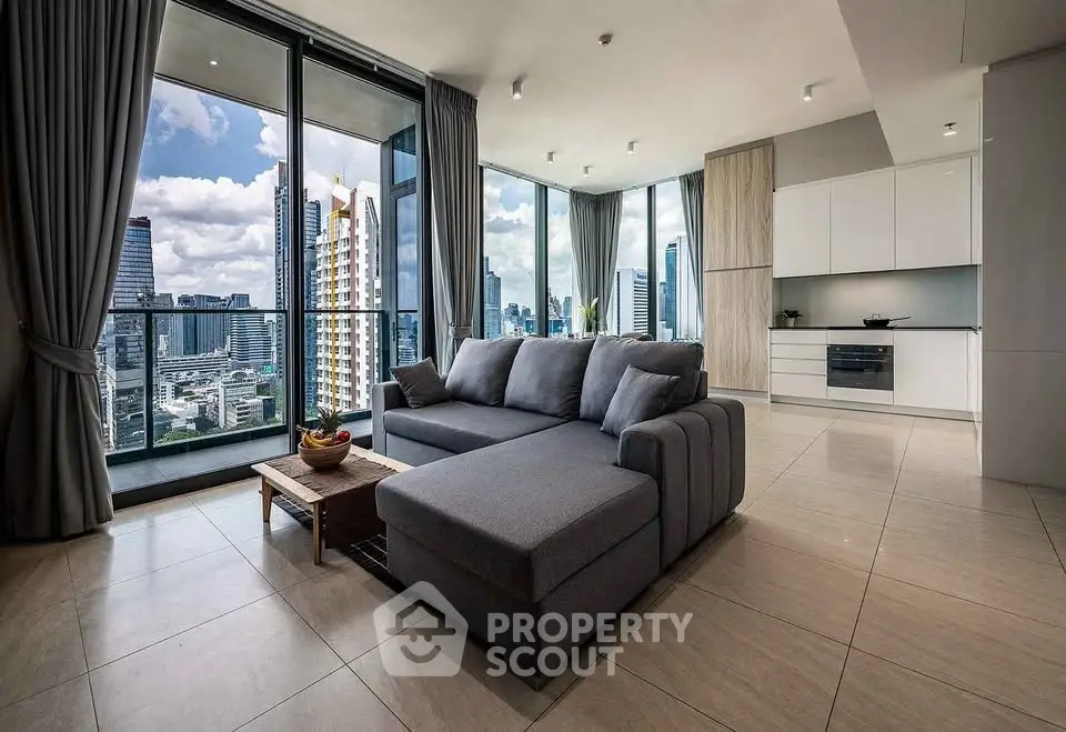Luxurious modern living room with panoramic city views and elegant furnishings.