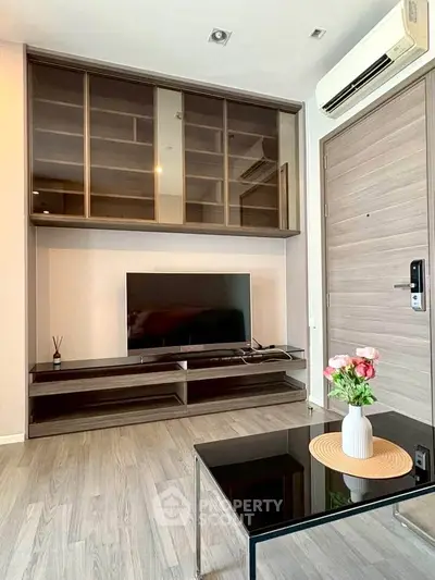 Modern living room with sleek TV unit and stylish decor