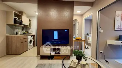 Modern living room with open kitchen and stylish decor