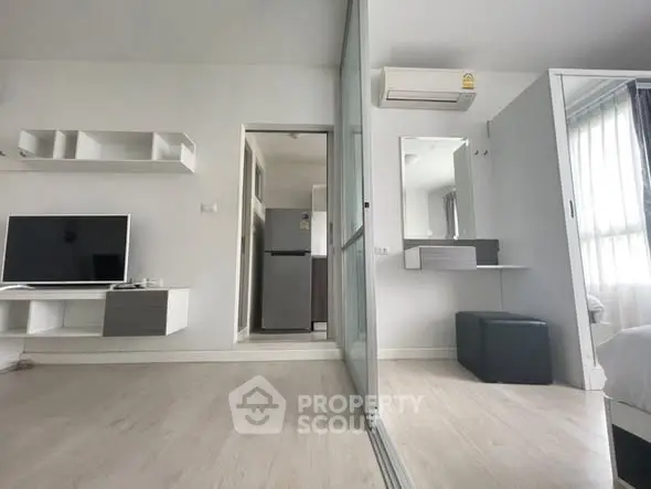 Modern studio apartment with sleek design and natural light