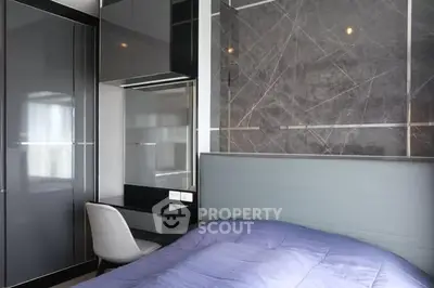 Modern bedroom with sleek design and built-in storage