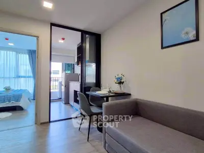 Modern apartment interior with cozy living room and bedroom view